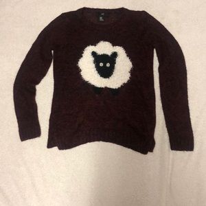 Maroon colored sheet sweater